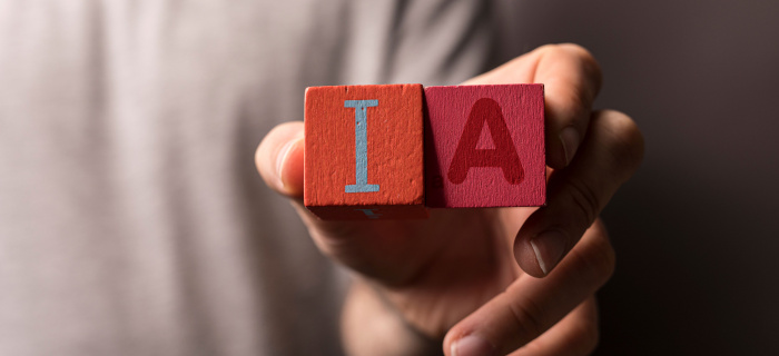 Dés représentant les lettres "IA"